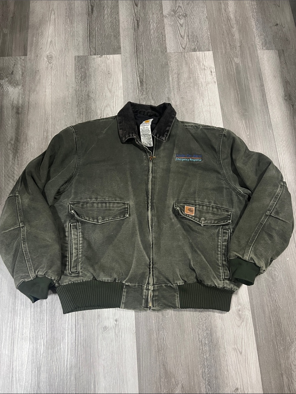 Carhartt vintage J165 MOS green bomber jacket
Size XL Regular